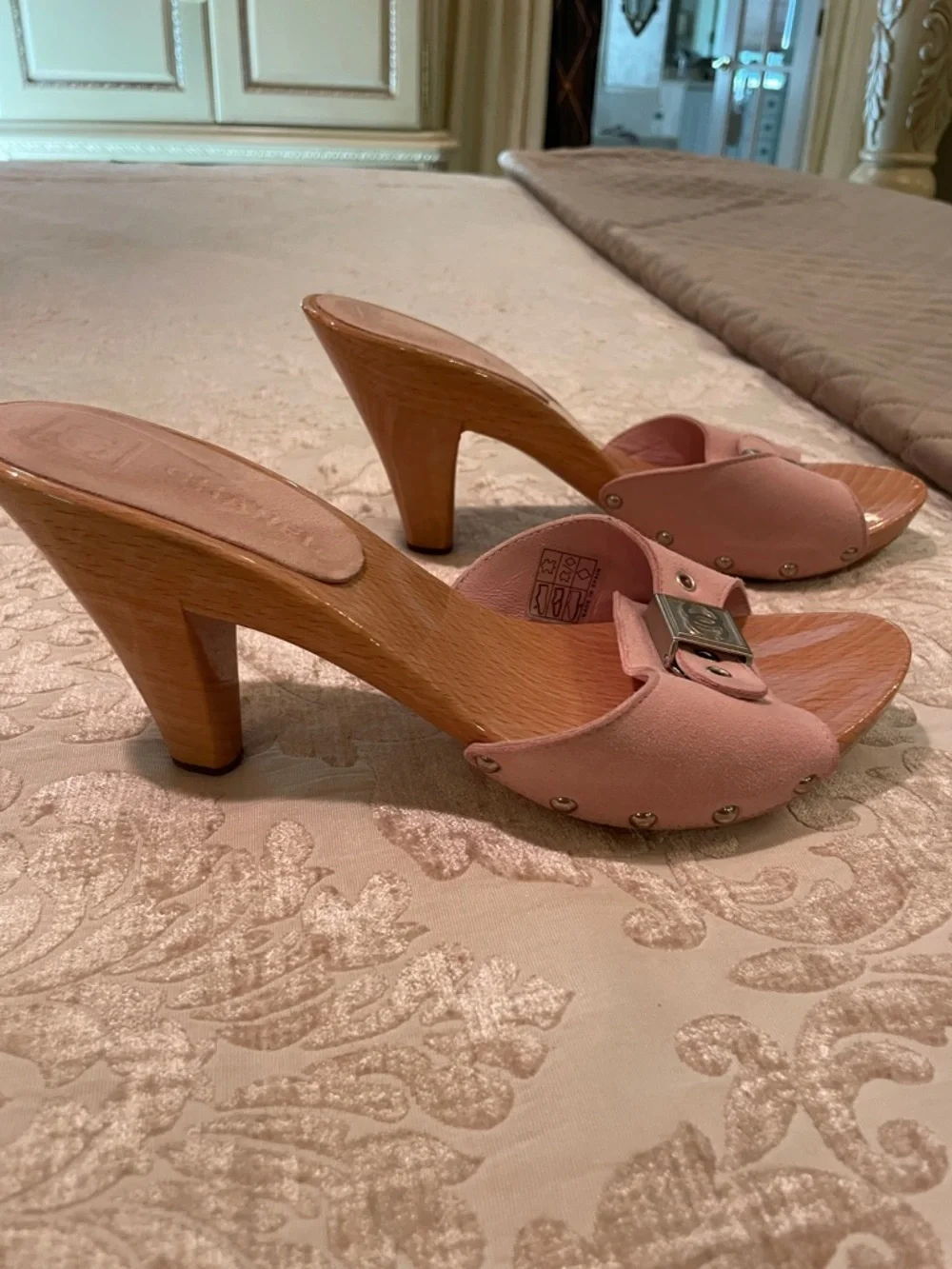 CHANEL Pink Leather Slide Mules with Silver CC Plaques. They are suede. Great